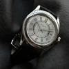 Side profile of Patek Philippe 6007G showing case thickness and crown