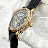 Side profile of Patek Philippe showing case thickness and crown