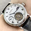 Side profile of Patek Philippe showing case thickness and crown